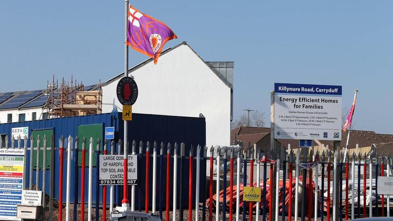Loyalist flags remain in place at a social housing development in Carryduff, Co Down. Pic Mal McCann. 
