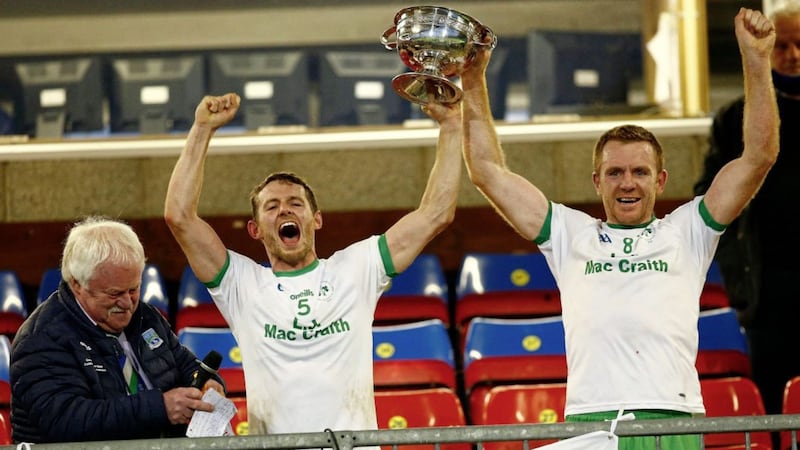 Declan McCusker and Martin McGrath (right) lift the New York Cup after Ederney's victory over Derrygonnelly in the 2020 Fermanagh SFC final<br />&nbsp; &nbsp; &nbsp; &nbsp; &nbsp; &nbsp; &nbsp; &nbsp; &nbsp; &nbsp; &nbsp; &nbsp; &nbsp; &nbsp; &nbsp; &nbsp; &nbsp; &nbsp; &nbsp; &nbsp; &nbsp; &nbsp; &nbsp; &nbsp;Picture: Philip Walsh