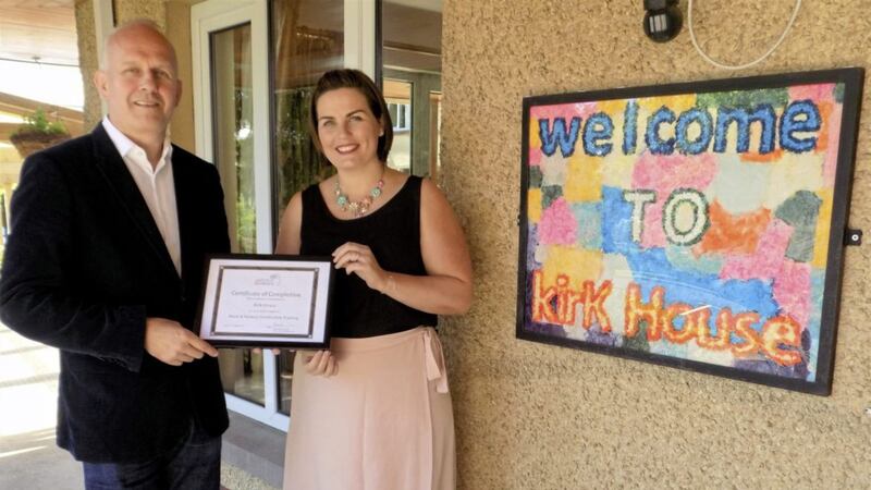 Kirk House has been recognised as Northern Ireland&#39;s first &lsquo;Music &amp; Memory&rsquo; certified home. Simon Warner-Bore, chief executive of Music &amp; Memory UK, presents the accreditation certificate to Kirk House Manager, Leona Larkham 