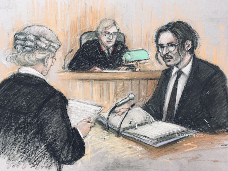 Court artist sketch by Elizabeth Cook of actor Johnny Depp (right) being cross-examined by Sasha Wass QC (left) (Elizabeth Cook/PA)