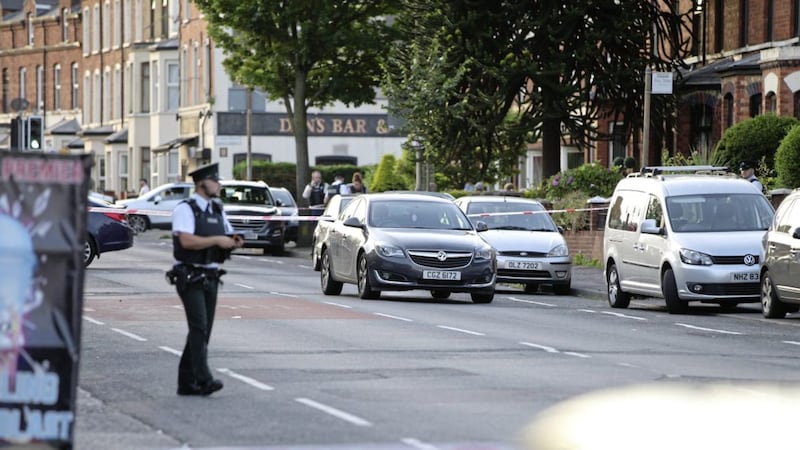 Police at the scene of Monday evening's shooting on Upper Springfield Road, west Belfast. Picture by Cliff Donaldson