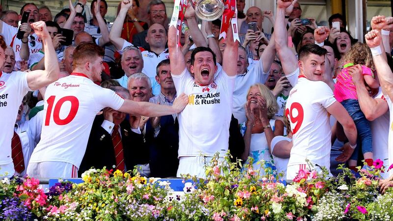 <span style="font-family: Arial, sans-serif; ">Tyrone go in search of a second successive Ulster Senior Football Championship title on Sunday - but an in-form Down squad stand in their way. Tyrone captain Sean Cavanagh is pictured celebrating with his team-mates as he lifts the Anglo Celt Cup last July after they defeated Donegal in the 2016 Ulster final at Clones. Picture by Seamus Loughran.</span>