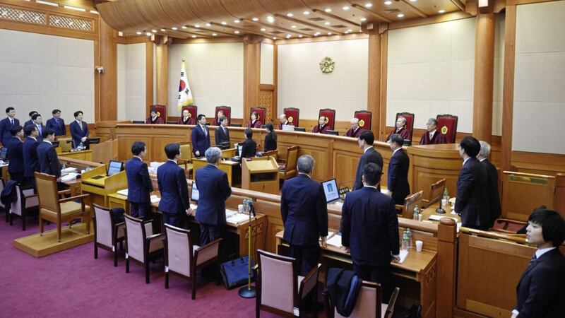 Nine judges of the Constitutional Court sit during a hearing on whether to confirm the impeachment of President Park Geun-Hye at the court. Picture by Jung Yeon-Je/Pool Photo via AP
