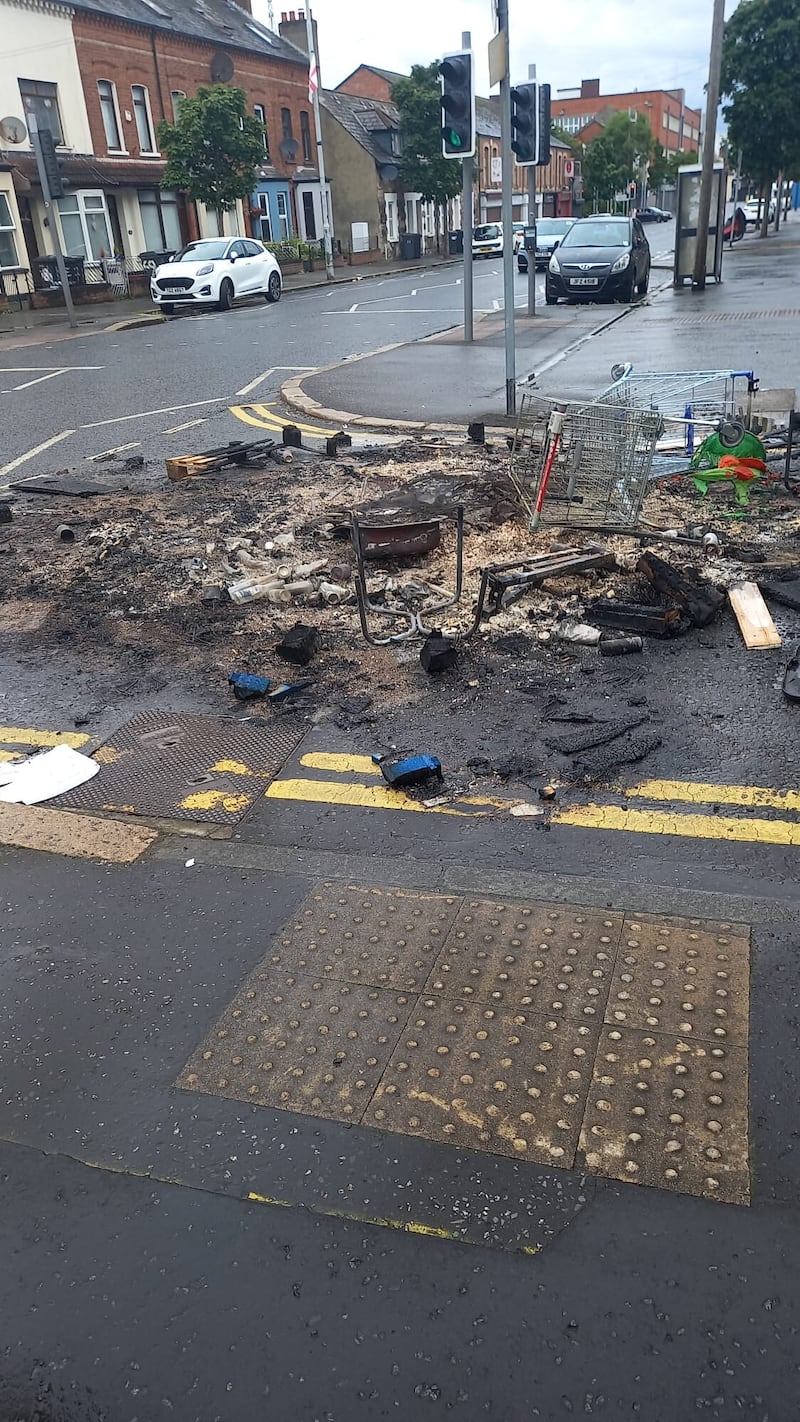 The aftermath of an eleventh night bonfire at Bloomdale Street in east Belfast 