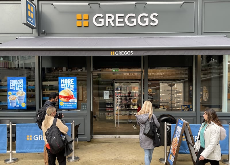 Customers outside a closed Greggs shop in central London