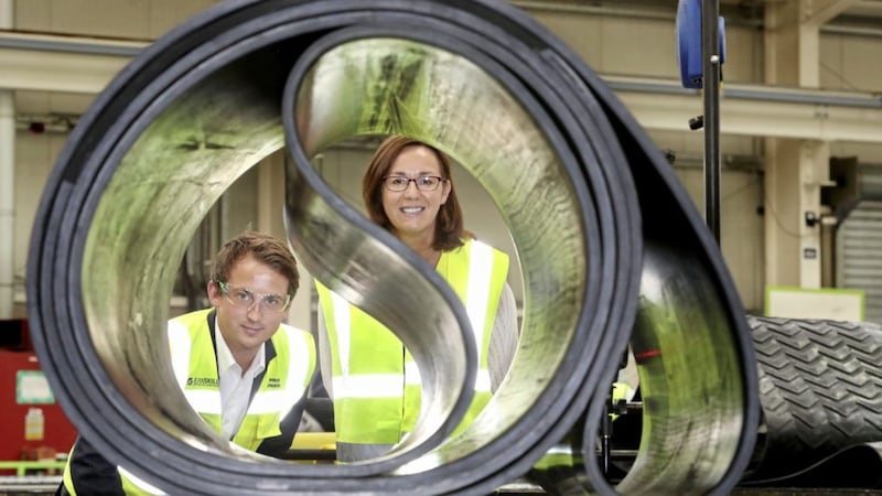 Lisburn based manufacturer Smiley Monroe has secured significant new business in the US and Asia worth &pound;265,000. Pictured are Chris Monroe, Smiley Monroe, and Alison Gowdy, Invest NI 
