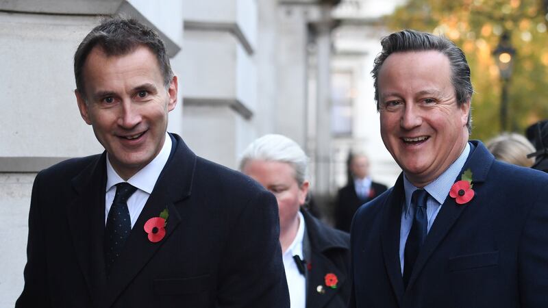 Jeremy Hunt and David Cameron walk through Downing Street (PA)