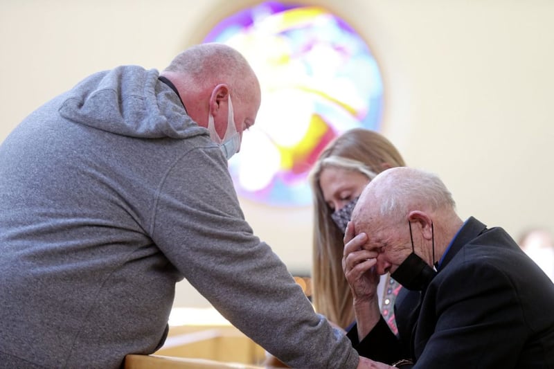 &nbsp;Bobby Clarke was shot during the Ballymurphy Massacre. He became emotional as the verdicts were returned in the inquest into the deaths of 10 innocent people and was comforted by Fr Paddy McCafferty in Corpus Christi Church. Picture by Mal McCann