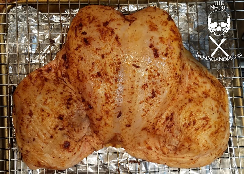 The start of an edible Facehugger made of chicken