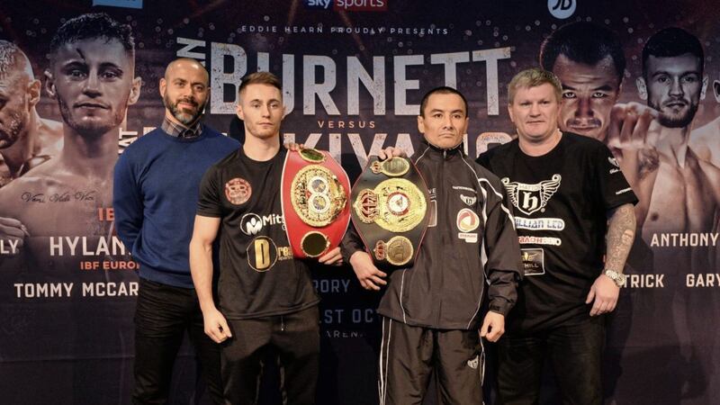 Ryan Burnett, with trainer Adam Booth, and Zhanat Zhakiyanov, with trainer Ricky Hatton, ahead of tonight&#39;s world bantamweight title unification battle at the SSE Arena - the first world unification fight ever to be held in Ireland. Photo Colm Lenaghan/Pacemaker Press 