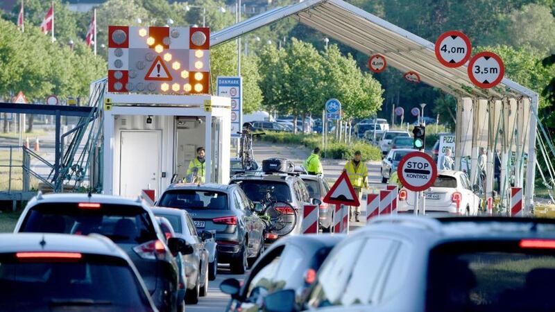 &nbsp;Cars are parked at the Krusau border crossing towards Denmark in Flensburg, Germany, on June 15 2020.&nbsp;German tourists are allowed to enter Denmark again since midnight. Picture by&nbsp;Carsten Rehder/dpa via AP