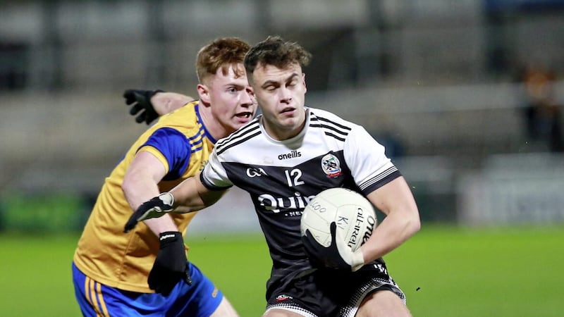 Enniskillen Gaels' Josh Horan and Kilcoo's Shealan Johnston in action during the Ulster Club Senior Football Championship Semi-Final between Enniskillen Gaels and Kilcoo at the Athletic Grounds Armagh. Picture by Philip Walsh 