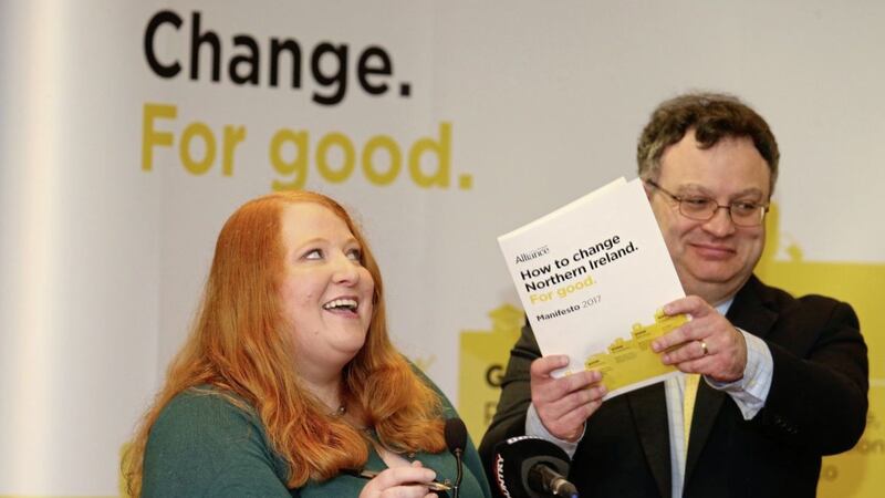 Alliance deputy leader Stephen Farry fans leader Naomi Long with during the party&#39;s manifesto launch. Picture by Mal McCann 