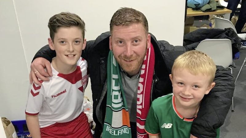 Mark Valentine with his son Callum (left, in white) and his nephew Louis Lennon (right, in green) before the match at the Aviva Stadium, where the cousins acted as mascots 