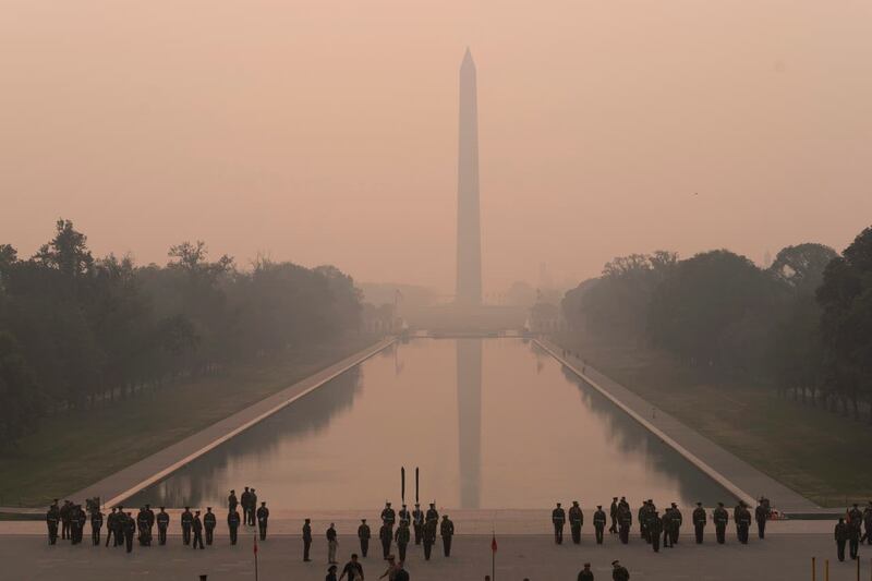 The Washington Monument amid a thick layer of smoke in Washington