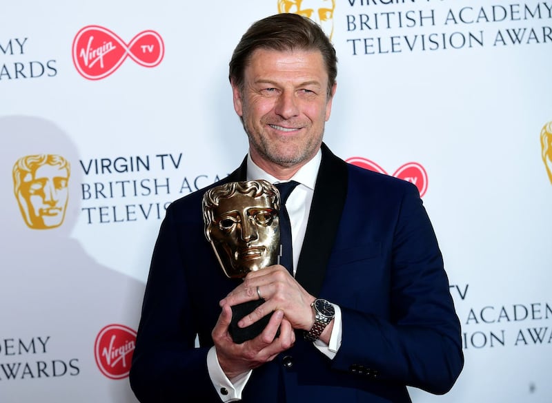 Sean Bean with his leading actor award (Ian West/PA)