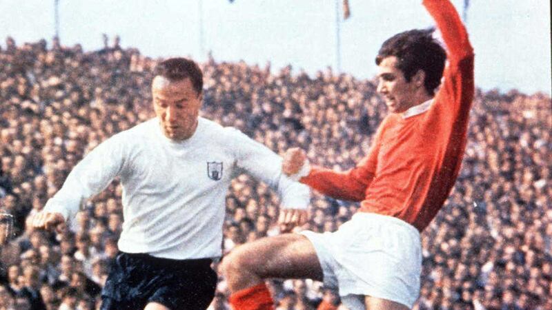 Northern Ireland legend George Best (right) moves into tackle England's World Cup winner George Cohen.&nbsp;