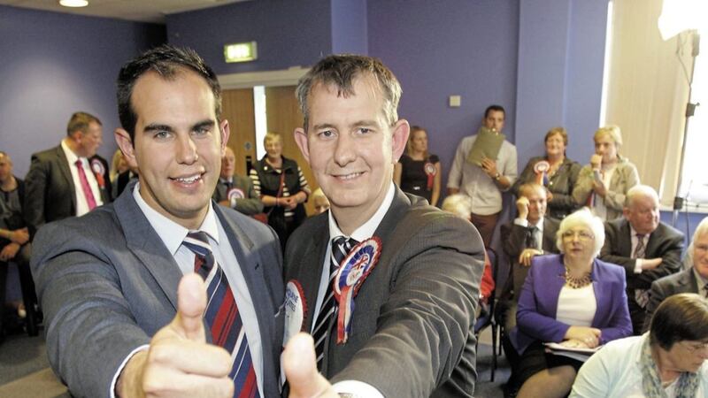 Luke Poots congratulated by his father Edwin Poots MLA after topping the poll and being elected to the Lisburn/Castlereagh super council. Picture by Cliff Donaldson 