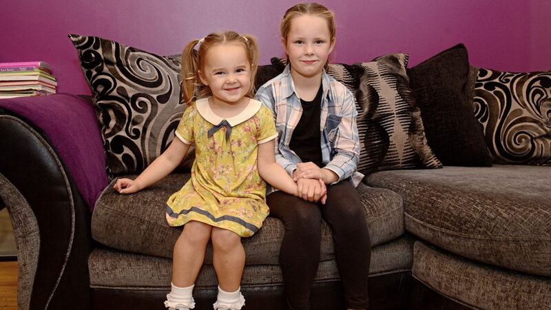 The O&#39;Donnell family pictured at their home in Downpatrick, Aoibhe(7) and Meabh(3). Picture by Arthur Allison/Pacemaker Press 