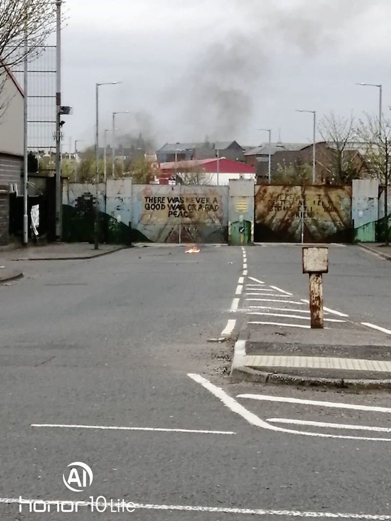 It is claimed a petrol bomb was thrown at nationalists in west Belfast