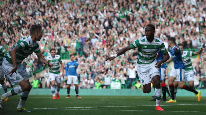 Celtic's Moussa Dembele (right) celebrates after scoring the first goal of the game during the Ladbrokes Scottish Premiership match at Celtic Park, Glasgow. &nbsp;