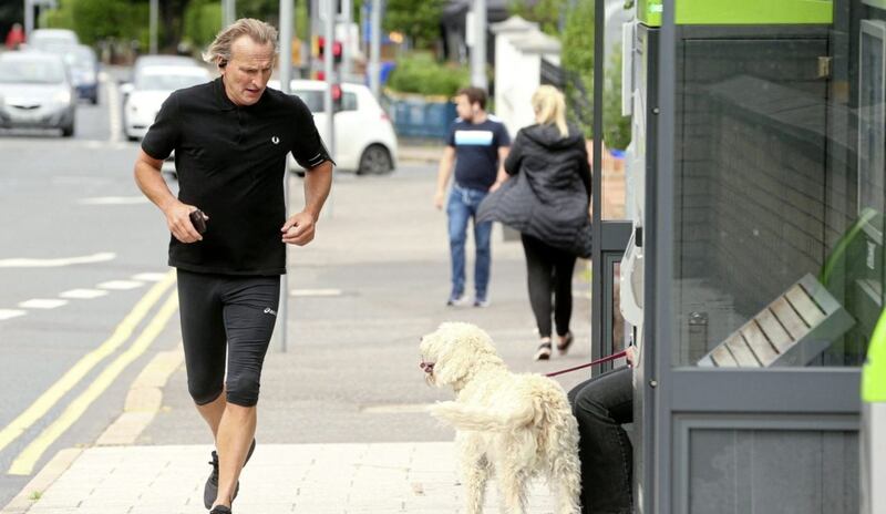 Actor Christopher Eccleston pictured while out jogging in Belfast. Picture by Mal McCann. 