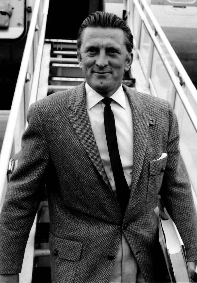 Kirk Douglas in London arriving from New York (PA)