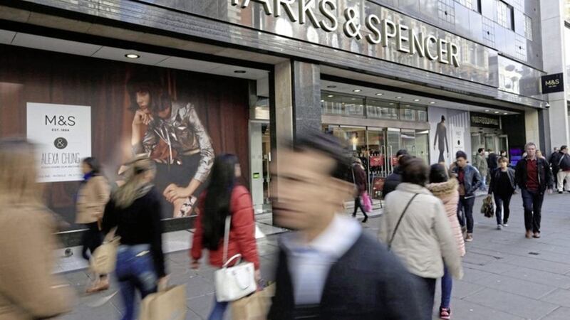 Marks &amp; Spencer has revealed &quot;mixed&quot; festive trading after another steep fall in sales in its clothing arm and disappointing trading in its food halls 