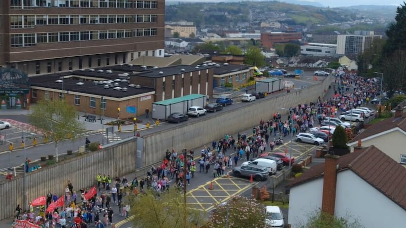 Hundreds march past Daisy Hill Hospital in Newry on Saturday in a rally protesting the moving of emergency surgery to Craigavon.
