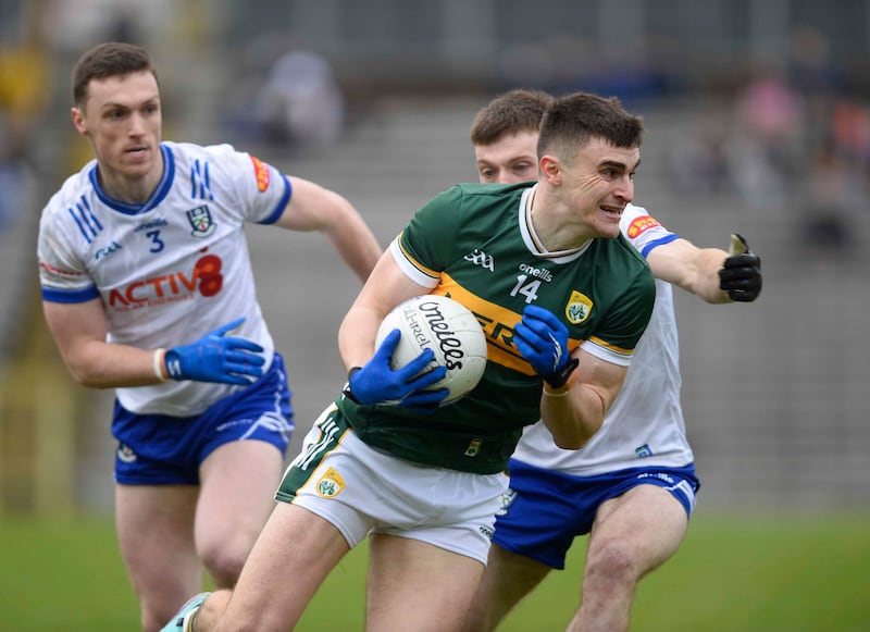 Kerry’s Sean O’Shea holds possesion under pressure from Monaghan’s Killian Lavelle and Ciaran McNulty