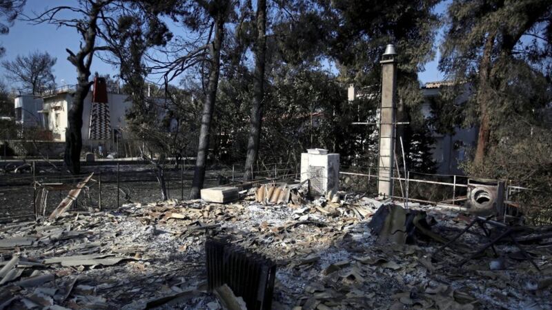 A burnt house in Mati, east of Athens. Experts said the devastated coastal town had been built like a &quot;fire trap,&quot; with poor safety standards and few escape routes PICTURE: Thanassis Stavrakis, AP 