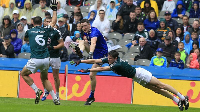 Monaghan's Conor McManus kicks a superb 70th minute score against Kildare in Croke Park on Sunday.