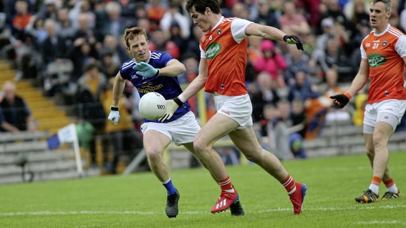 Armagh&#39;s Jarlath Og Burns in action with Cavan&#39;s Jason McLoughlin in the Ulster Football semi-final game at Clones on Sunday June 2 2019. Picture by Seamus Loughran. 
