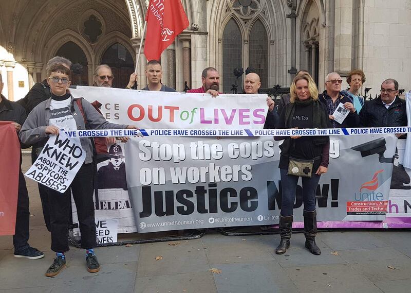 Campaigners affected by the undercover policing scandal outside the Royal Courts of Justice.