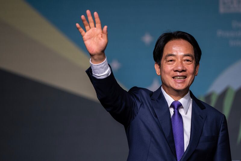 Lai Ching-te celebrating his election victory in Taipei earlier this month (AP)