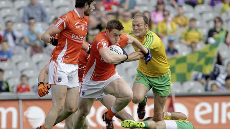Bursting out of defence under pressure from Donegal&#39;s Colm McFadden at Croke Park. Pic Seamus Loughran 