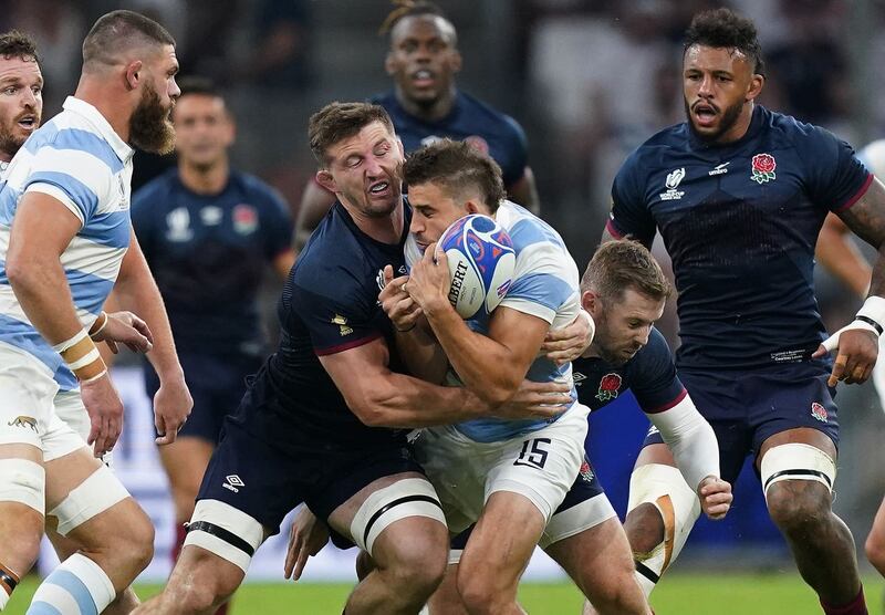England’s Tom Curry (left) was sent off against Argentina 
