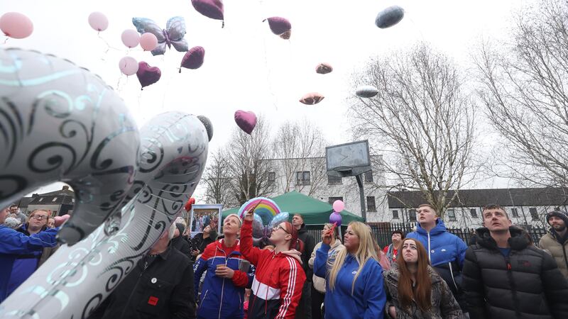 Balloons are released during a memorial event for Chloe Mitchell at King George’s Park, Ballymena