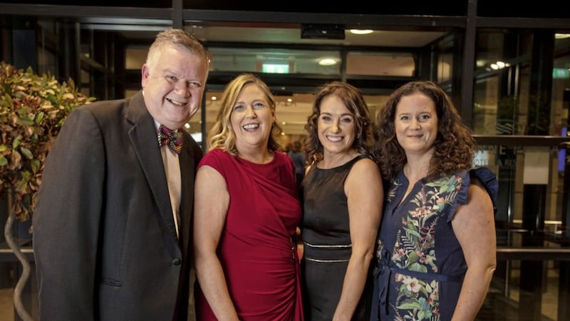 Women in Business chief executive Roseann Kelly with Business Woman of the Year 2019 winner Edel Doherty from Beyond Business Travel, third from left, with sponsor representatives Gary McDonald of The Irish News and Virgin Media Business people director Alison Bawn