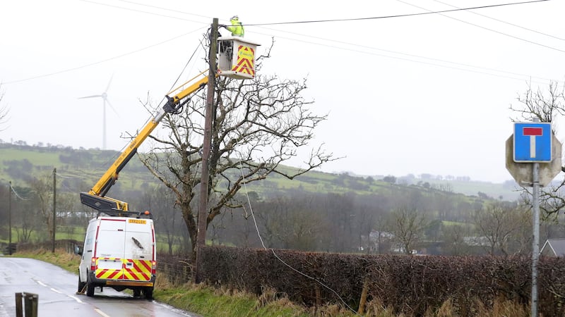 Repairs being carried out to the powerlines  outside North Belfast on Tuesday.
All Counties where  severely affected by Storm Isha on Sunday and Monday.
A further yellow weather warning for wind begins at 16:00 GMT on Tuesday.
PICTUERE: COLM LENAGHAN