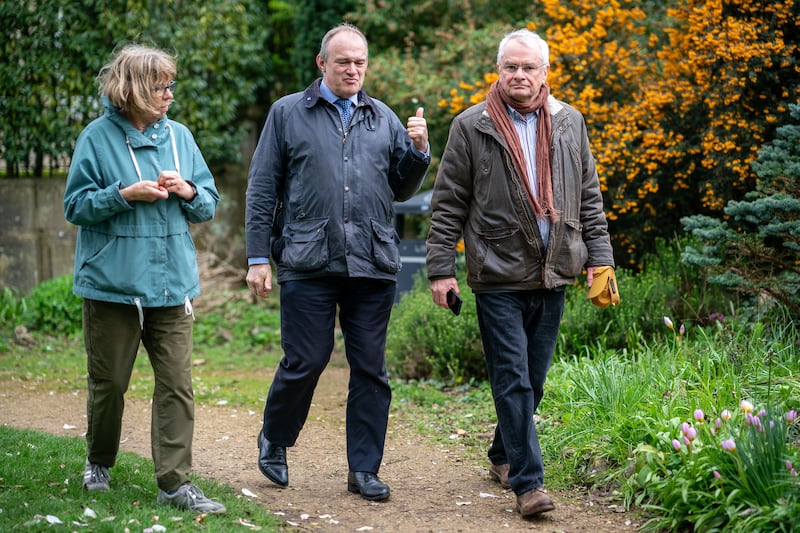 Liberal Democrat leader Sir Ed Davey with Cllr Angela Conder and Cllr Jeremy Hilton during a visit to Hillfield Gardens in Gloucester