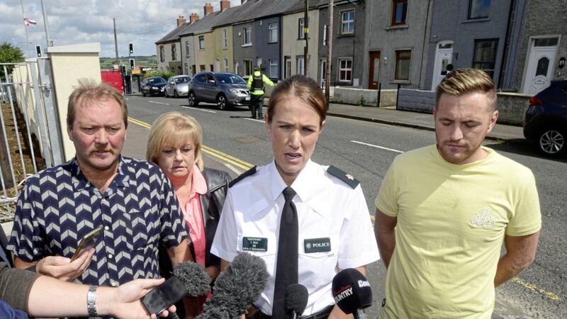 PSNI Superintendent Emma Bond with missing man Dean McIlwaine&#39;s father Rod, brother Glen and mother Karen. Picture by Arthur Allison, Pacemaker 