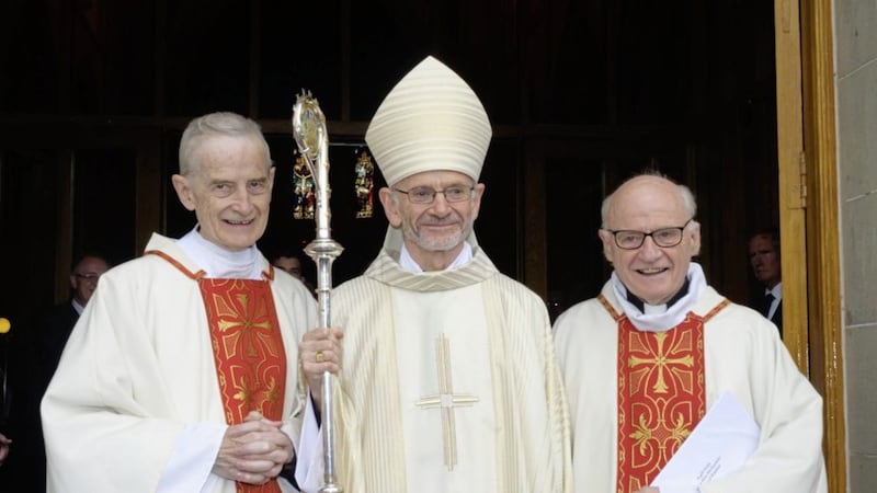 The new Bishop of Raphoe, Bishop Alan McGuckian SJ, with his brothers Fr Michael McGuckian SJ (left) and Fr Bernard McGuckian SJ at his ordination. Picture by Liam McArdle 