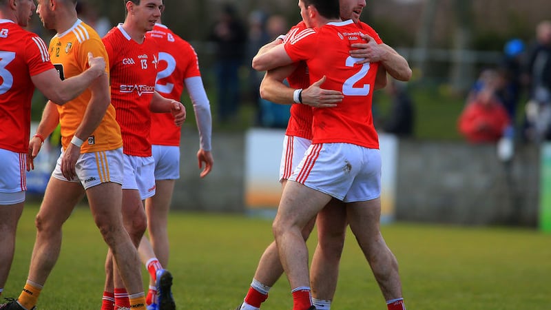 Louth players Sam Mulroy and Dan Corcoran celebrate after their side's win over Antrim in the Allianz Football League Division Three match in Ardee on Sunday                          Picture: Seamus Loughran&nbsp;
