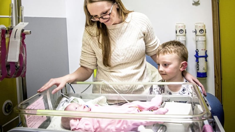 Jodie with son Iuean and baby Phoebe in the Neonatal Unit at Birmingham Women&rsquo;s Hospital.  - (C) Dragonfly / Ryan McNamara - Photographer: Ryan McNamara 