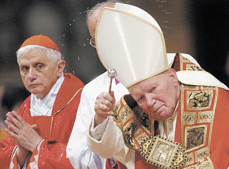  Cardinal Joseph Ratzinger of Germany left now Pope Benedict XVI is seen with late Pope John Paul II during mass in St. Peter's Basilica at the Vatican. 