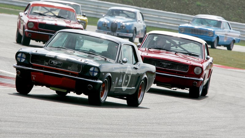 Ford Mustangs on the circuit at Silverstone