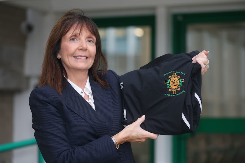 Siobhan Kelly, principal of St Mary's Christian Brothers' Grammar School, with one of the MacLarnon Cup tops that Kanye West was pictured wearing. Picture by Mal McCann
