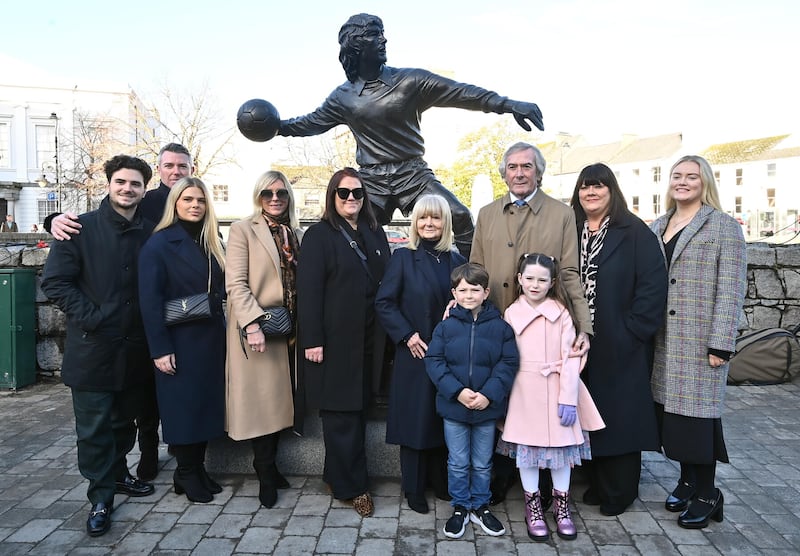 Former Tottenham and Northern Ireland goalkeeper Pat Jennings (third right) with his wife Eleanor Toner (fourth right) and family members, at the unveiling of a statue in his honour in Newry town centre      Picture: Oliver McVeigh/PA