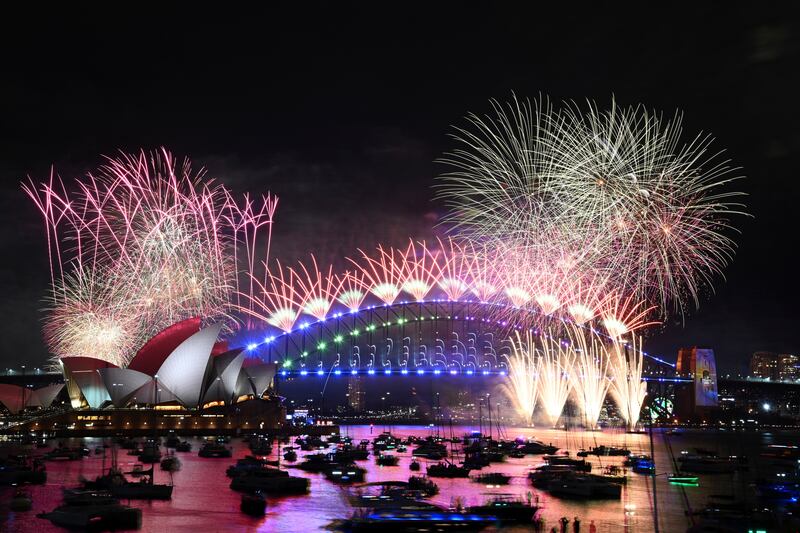 Fireworks explode over Sydney Opera House and on the Harbour Bridge as part of Australia’s New Year’s Eve celebrations (Dan Himbrechts/AAP Image/AP)